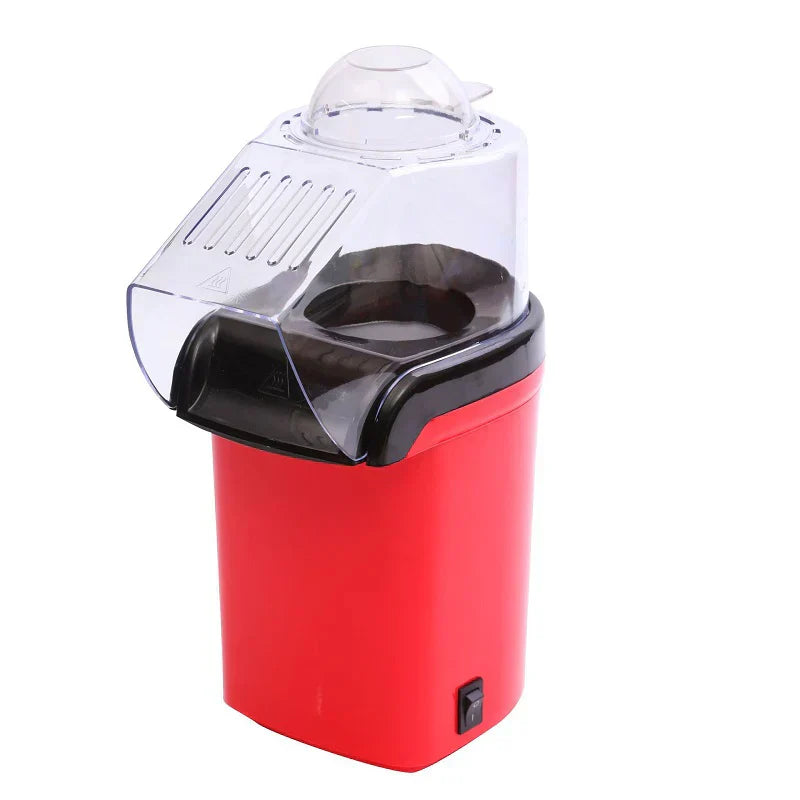 Compact red mini popcorn machine with clear plastic lid and black base switch. - Mini PopCorn Machine - Menzaar - Default Title